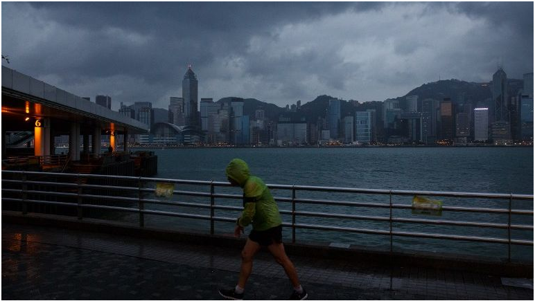 Typhoon kills 12, destroys rice fields in Philippines, takes aim at Hong Kong
