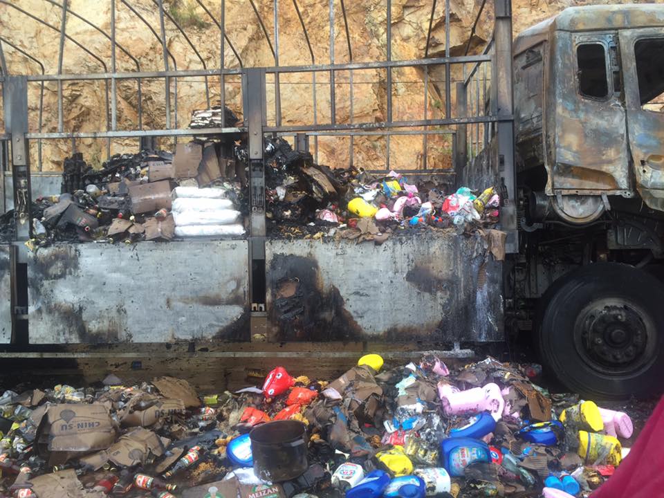 Police retrieve 200kg goods looted from burned truck in central Vietnam