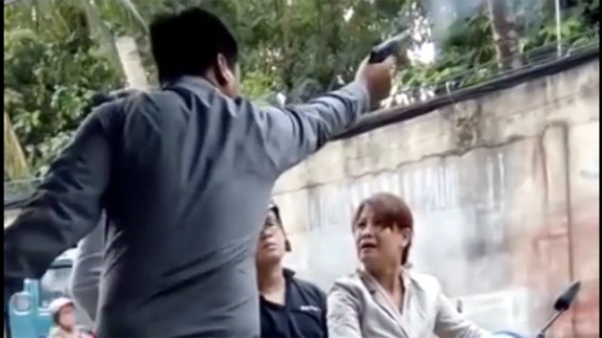 Alleged security firm director seen firing gun during quarrel with woman in Saigon