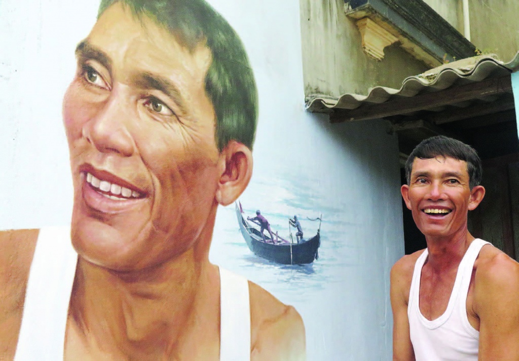 Vietnam's mural fishing village in photos