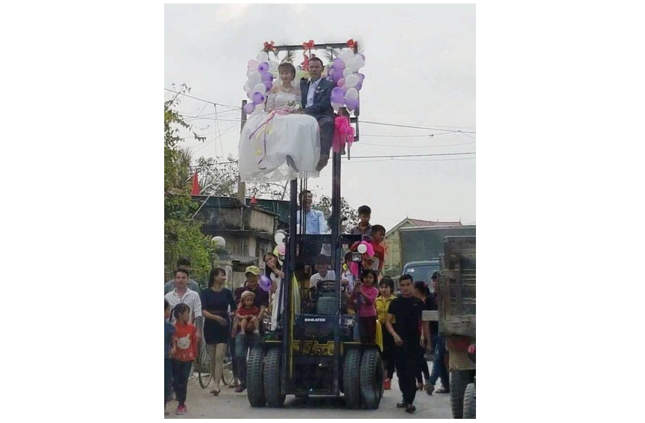 Vietnam groom scorned for taking bride home on forklift
