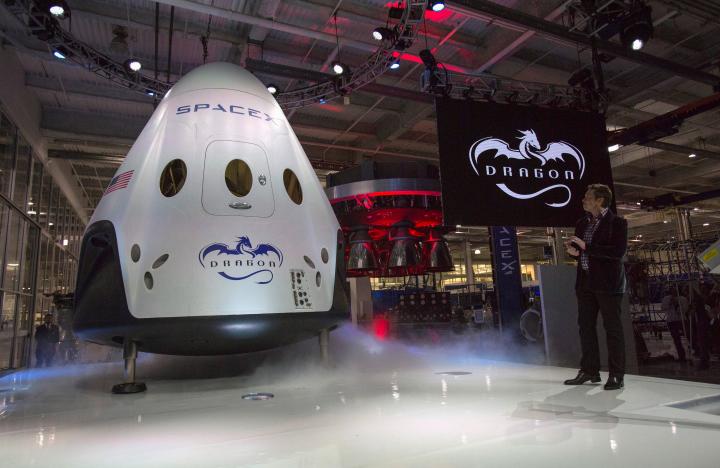 SpaceX to send first paying tourists around moon next year