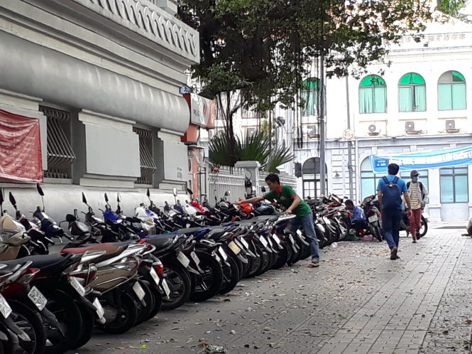 Cyclists turned down by Ho Chi Minh City parking lot attendants