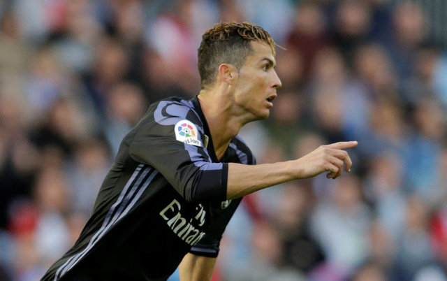 Real Madrid on verge of title after Ronaldo inspires win at Celta