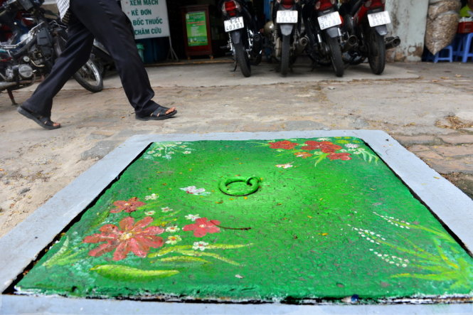 Painted manhole covers in Saigon hoped to increase environmental awareness
