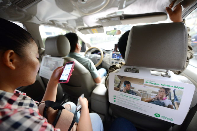 Vietnam says no to fare-splitting on Grab, Uber
