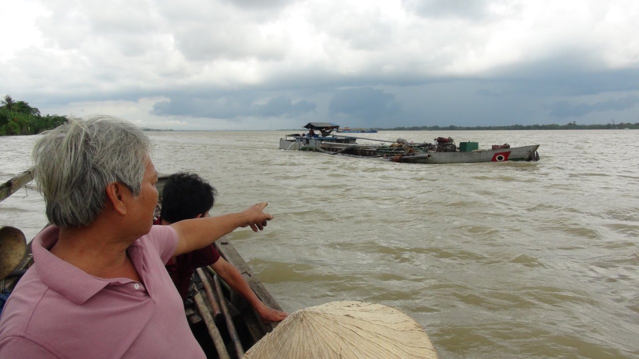 Locals team up against sand thieves in Vietnam’s Mekong Delta