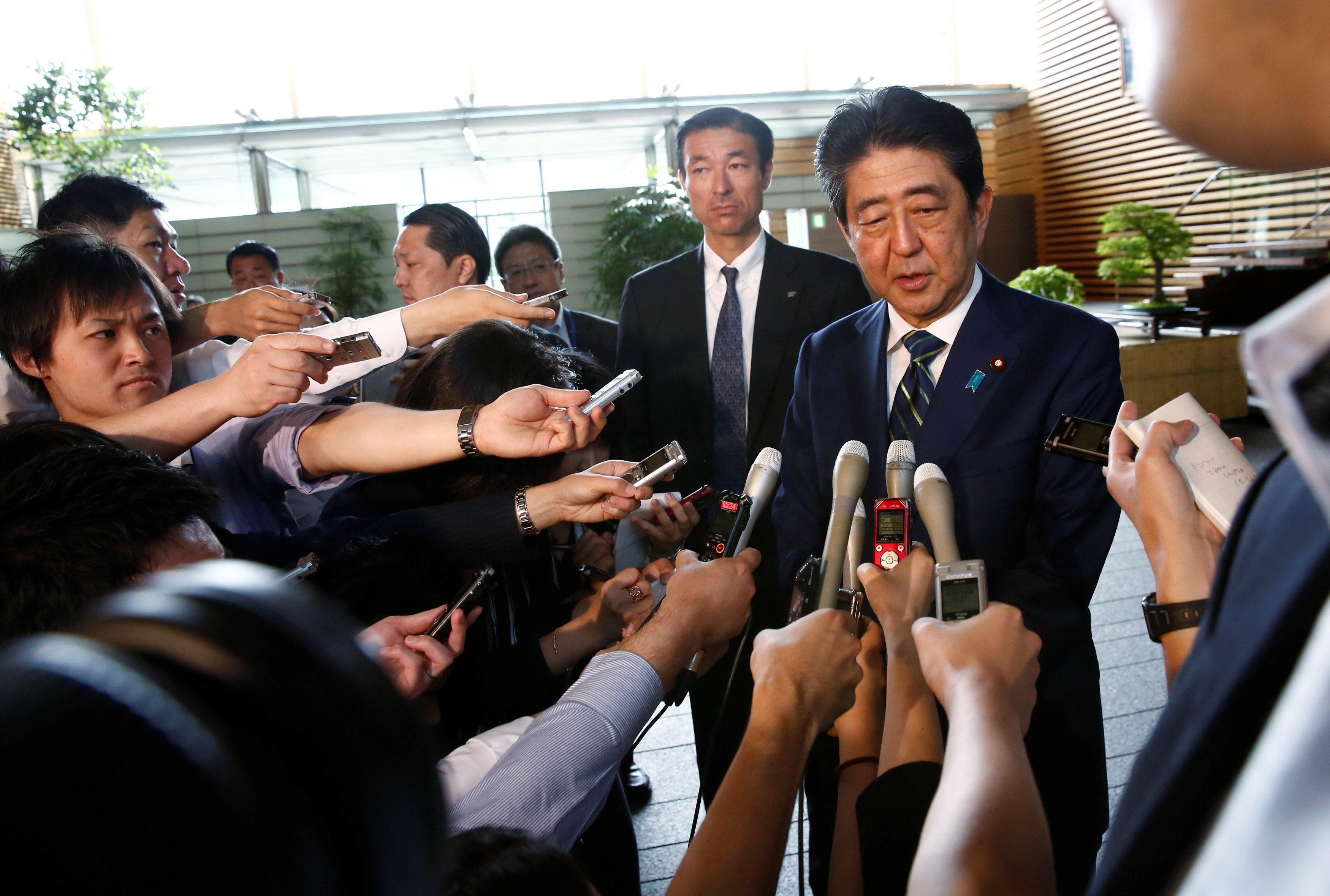 Japan PM's party suffers historic defeat in Tokyo poll, popular governor wins big