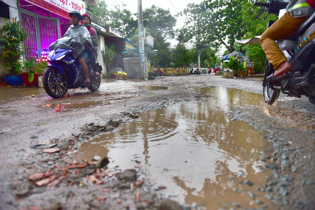 Damaged roads become hazards in Ho Chi Minh City