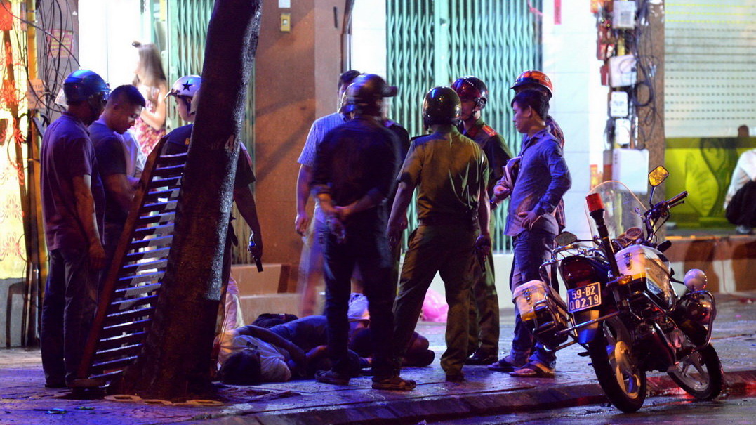Police fire warning shots to quell late night gang fight in downtown Saigon