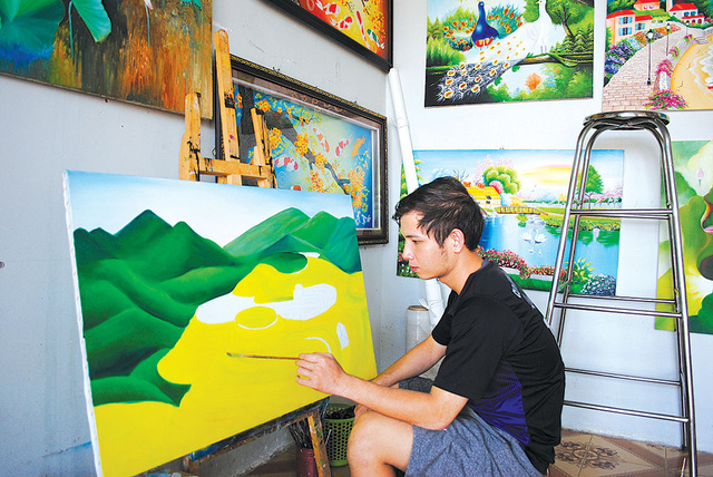 In Vietnam, hearing-impaired youth shapes own destiny with art