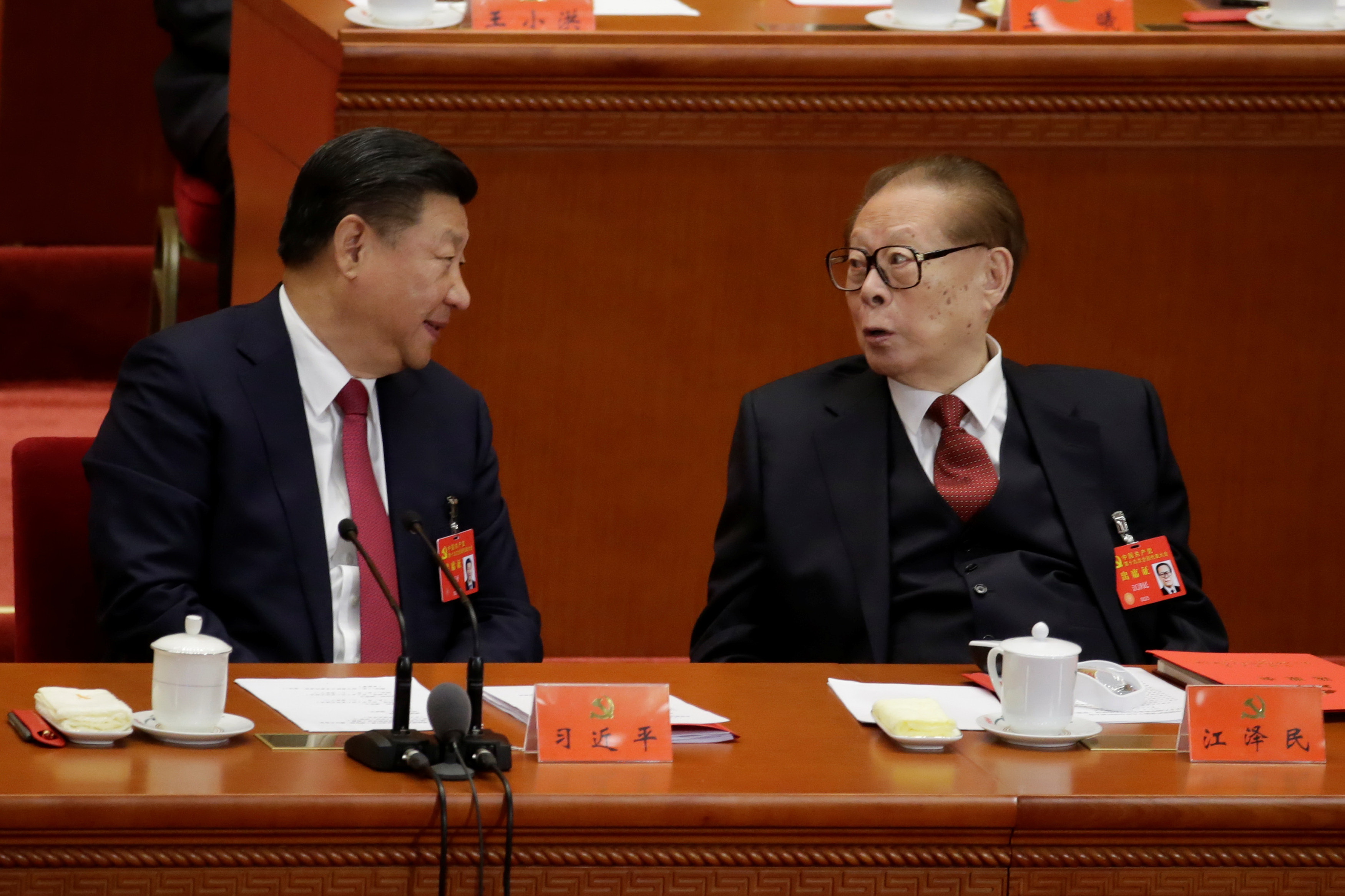 China enshrines 'Xi Jinping Thought', key Xi ally to step down
