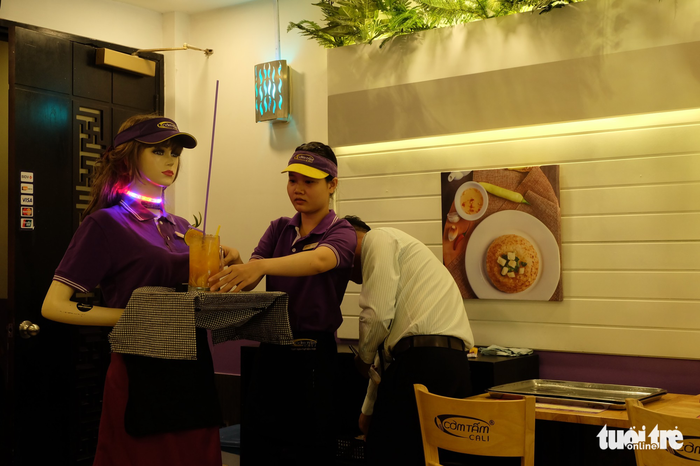 Co Ba the robot waitress serves food at a restaurant in Ho Chi Minh City. Photo: Tuoi Tre