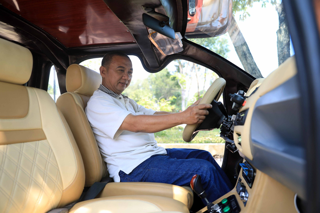 Vietnamese man makes electric car out of passion
