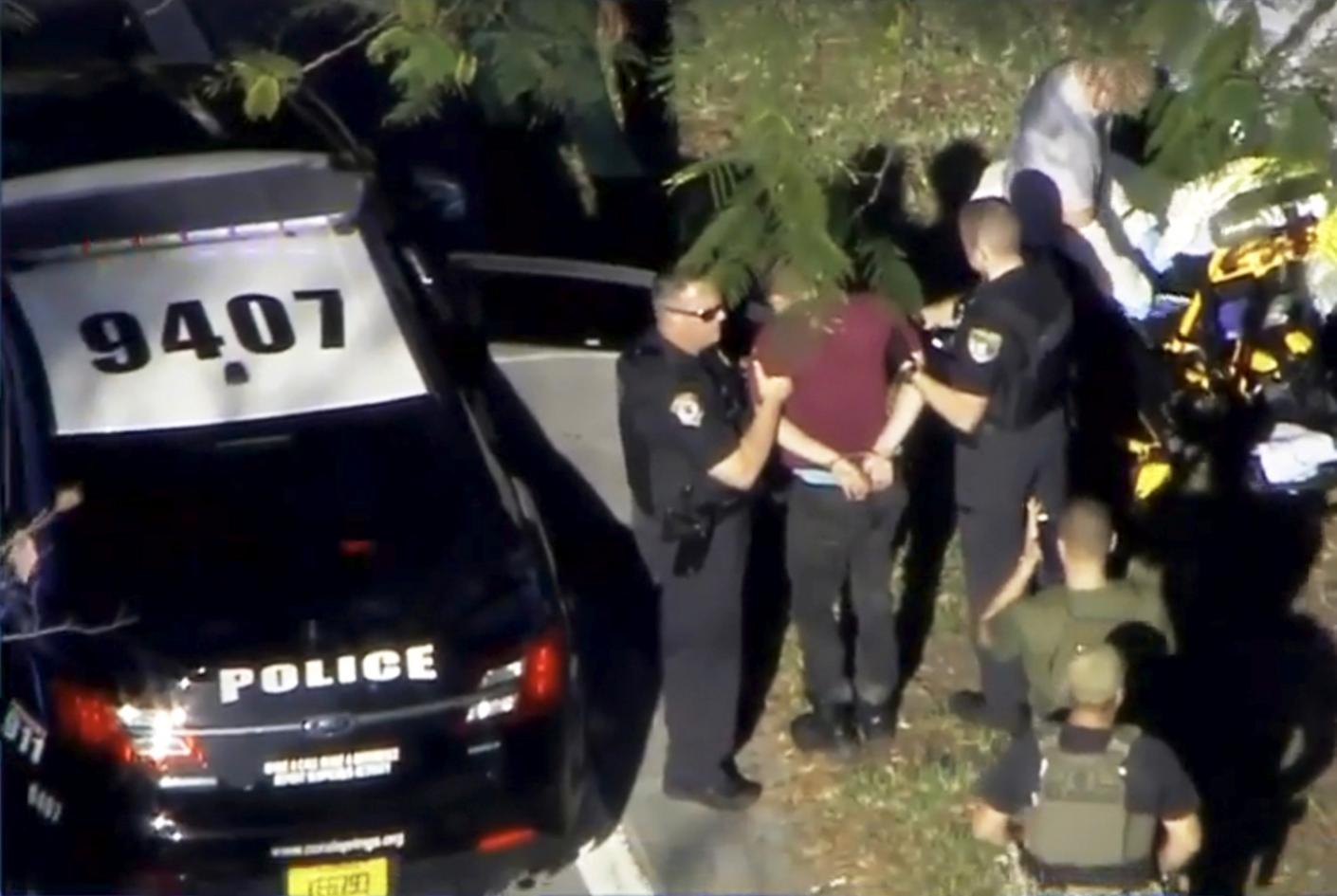 Ex-student arrested after 17 shot dead at Florida high school