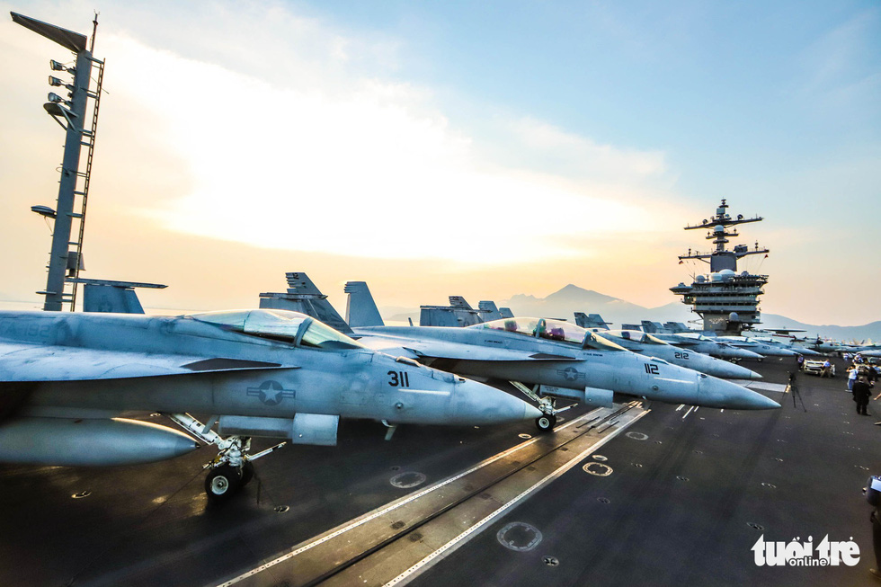 Different aircraft are seen on the deck of the USS Carl Vinson, docking off Da Nang City, central Vietnam, on March 5, 2018. Photo: Nguyen Khanh/Tuoi Tre