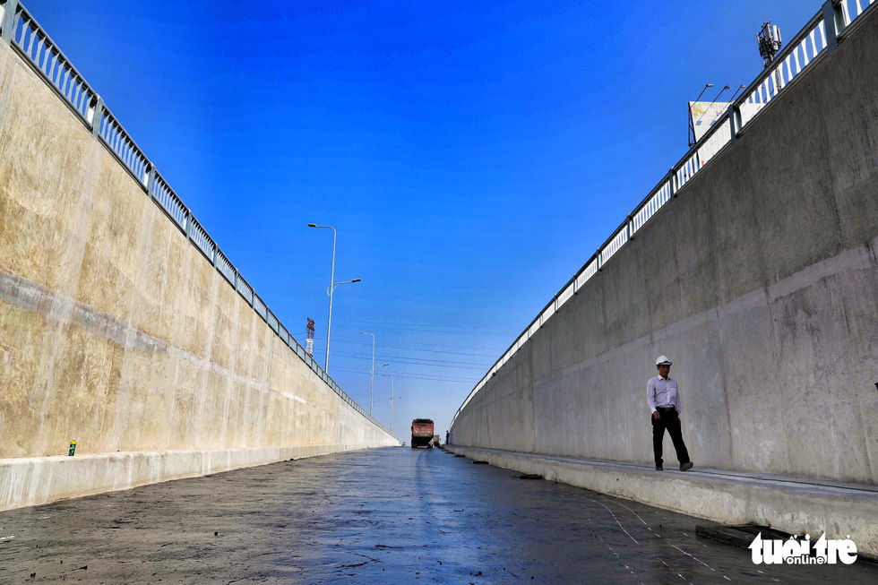 A man walks down the first branch of the An Suong underpass in Ho Chi Minh City. Photo: Tuoi Tre