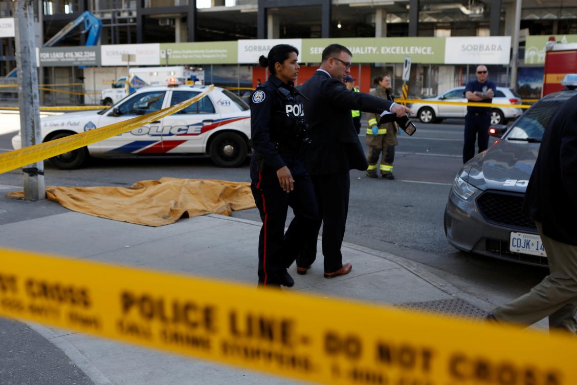 Driver kills 10, injures 15 plowing van into Toronto sidewalk crowd
