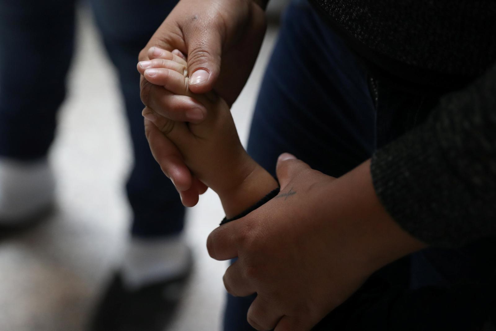 U.S. says still working to reunite 2,053 children with families