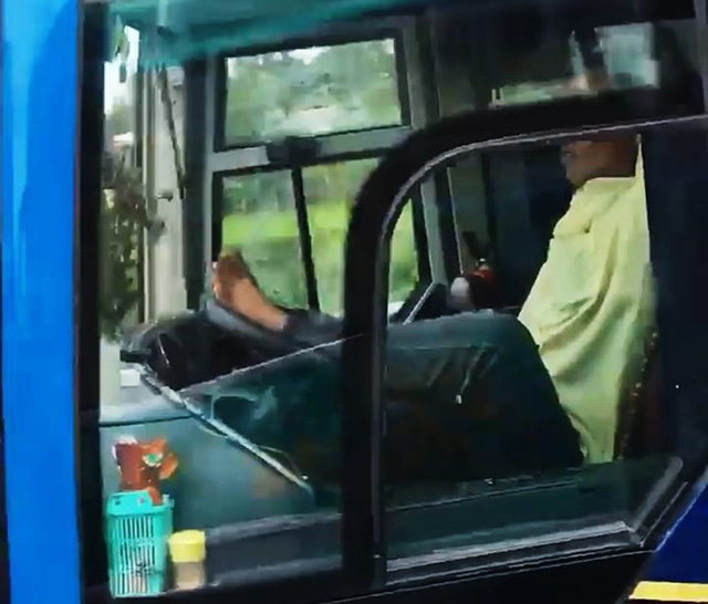 Vietnamese driver fined for using legs to steer passenger bus on expressway