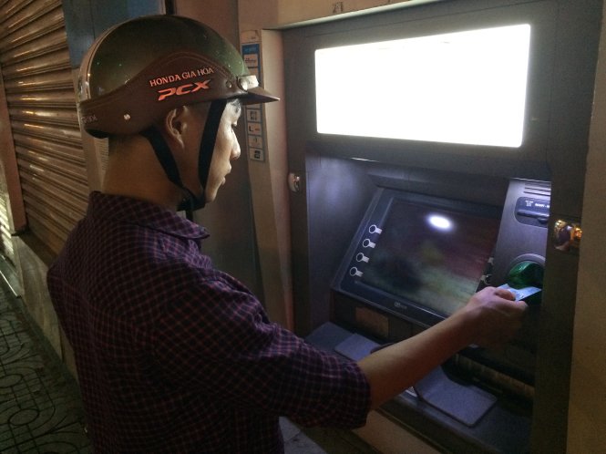 Vietnam’s state bank asks lenders to lower limit for late-night ATM withdrawals