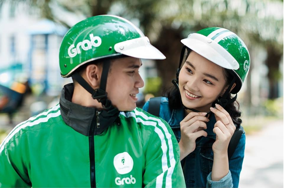 Vietnamese Grab users accuse ride-hailing app of forced use of e-wallet