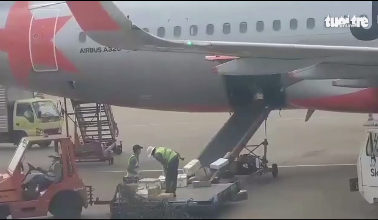 Vietnamese airline employees filmed hurling passenger goods onto plane