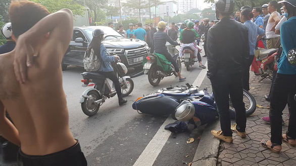 Audi car reversing at high speed plows into traffic in Hanoi