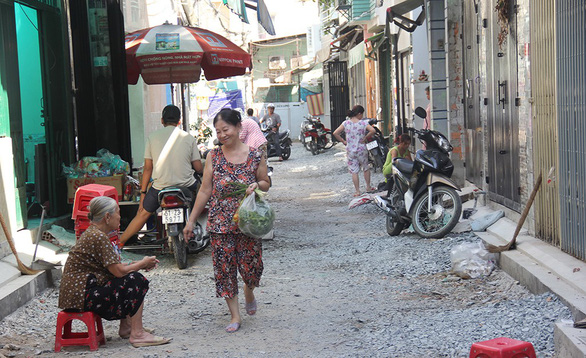 Ho Chi Minh City residents willingly give up land for alley expansion