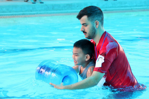 Australia-backed project teaches kids how to swim, save drowning victims in Vietnam’s Mekong Delta