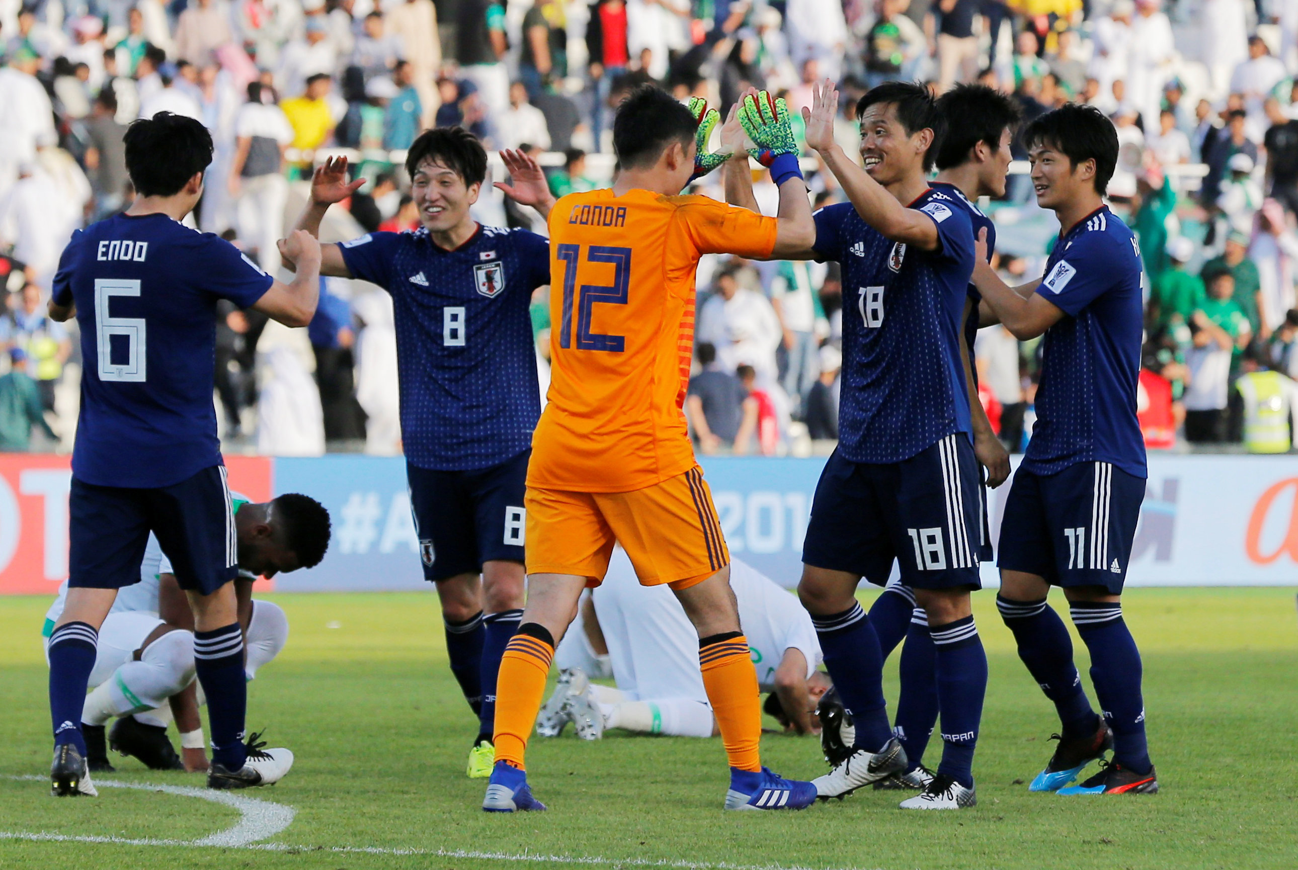 Japan edge profligate Saudis to meet Vietnam in Asian Cup quarter-finals