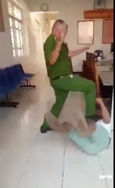 Policeman in Vietnam suspended after being filmed stomping on brawl witness