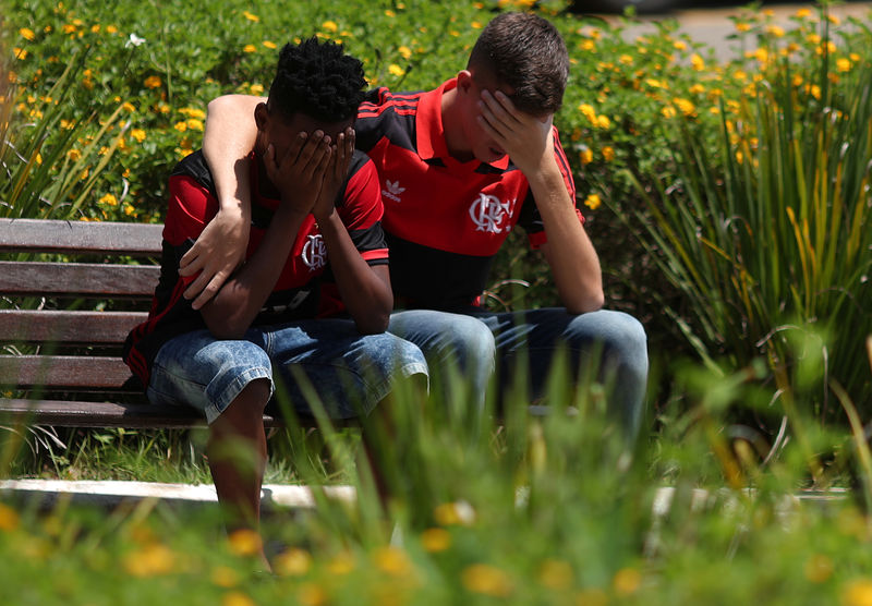 Fatal fire exposes poor conditions for young Brazilians