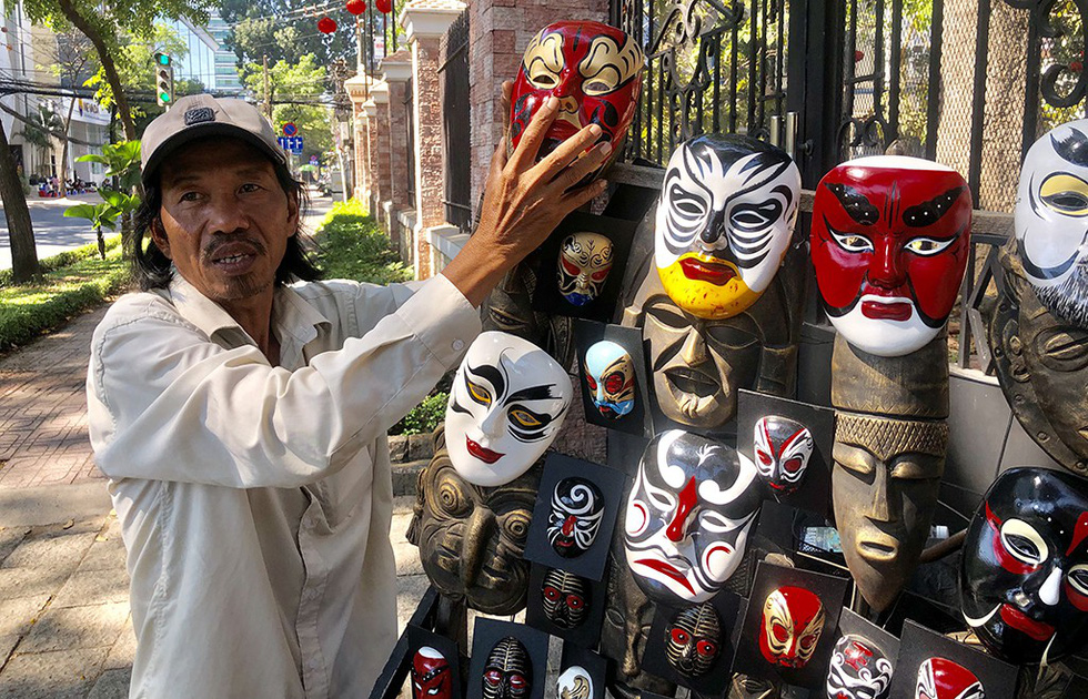 Vietnamese man devotes life to making traditional masks despite their waning popularity