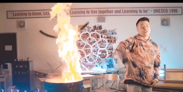 Hanoi students accuse rappers of burning their textbooks in filming of music video