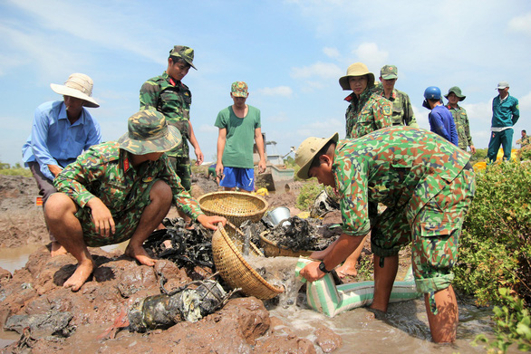Vietnam authorities start retrieving military plane wreckage kept unreported for seven years