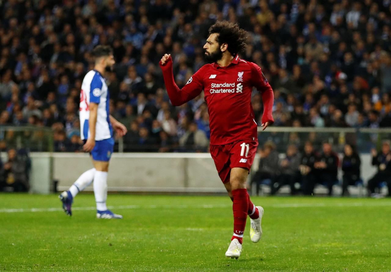 Salah shines as clinical Liverpool see off Porto