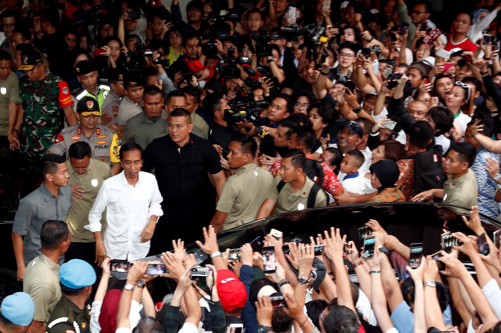 Indonesian 'quick counts' underline Widodo poll win, markets rally
