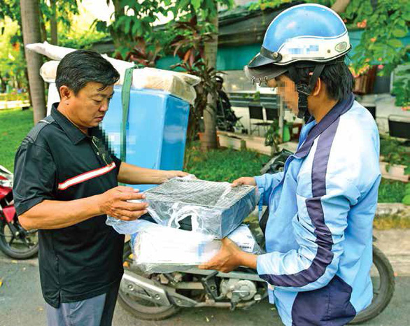 In Vietnam, online shoppers concerned as delivery services require ID photo