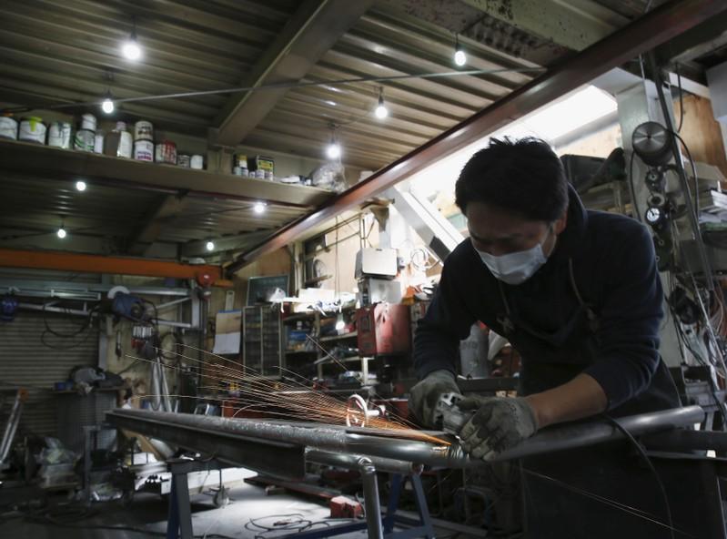 Factory activity shrinks across Asia, stokes global recession fears
