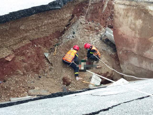 Two dead in road collapse as Tropical Storm Mun makes landfall in Vietnam