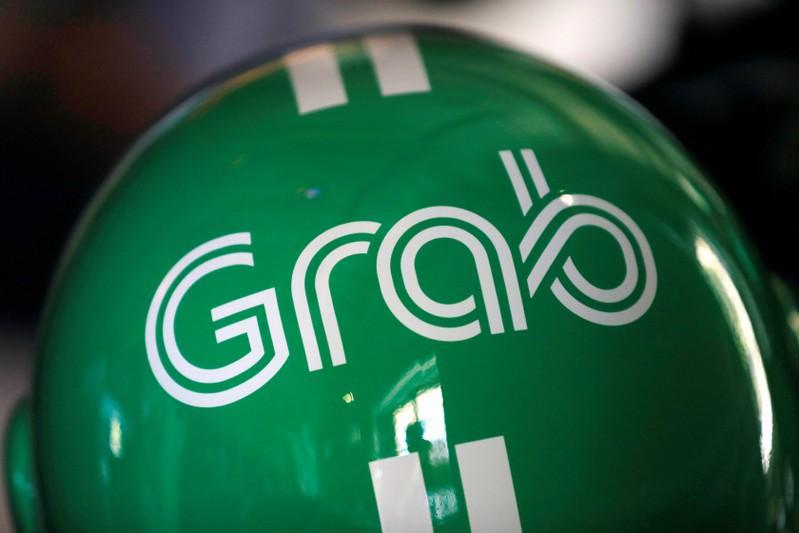 Ride-hailing firm Grab plans major investment in Vietnam: top executive