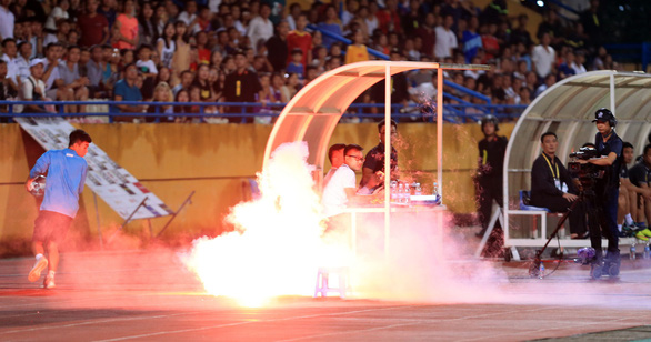 Man arrested for firing flare that injured spectator at Vietnam’s league match