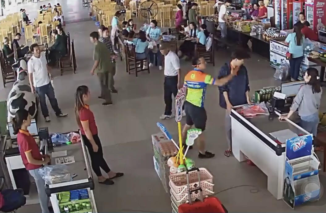 CCTV shows Vietnam policeman slapping store clerk after son fails to pay for sausages