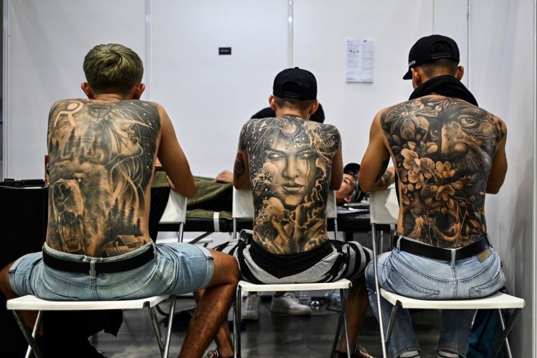 Malaysia orders inquiry over half-naked tattoo show