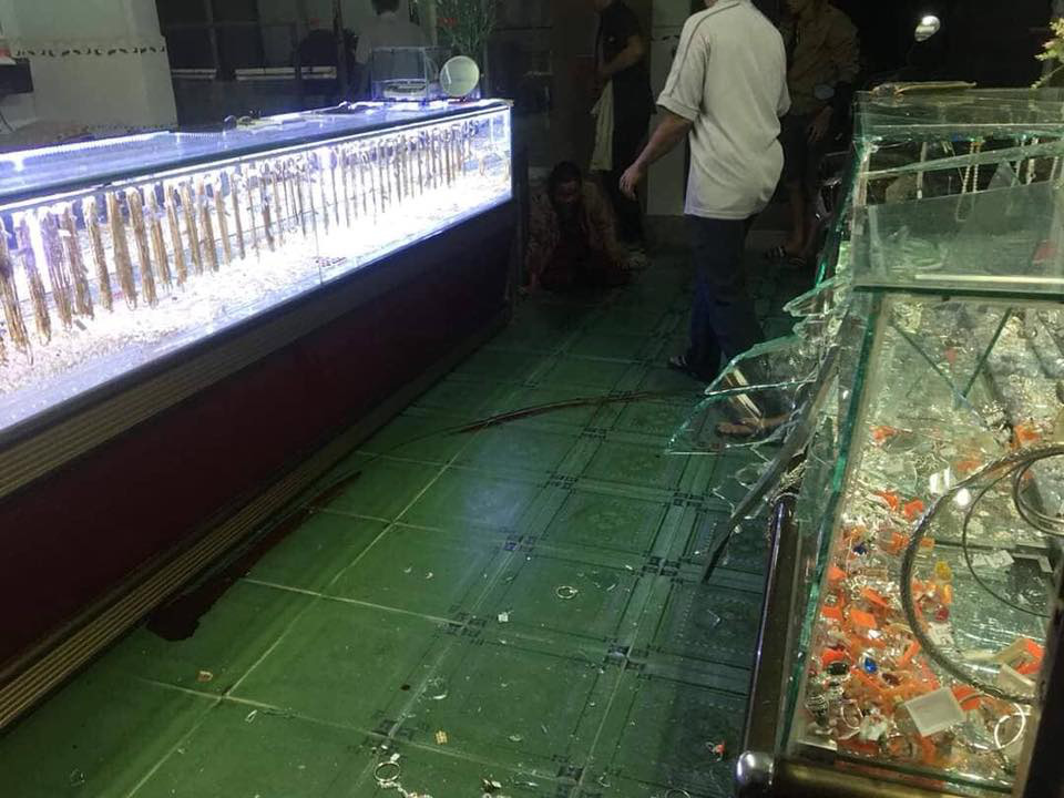 In Vietnam, gold shops robbed as owners watch SEA Games football