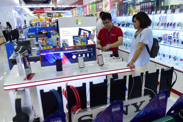 Vietnam’s Vingroup divests retail business to focus on cars, smartphones
