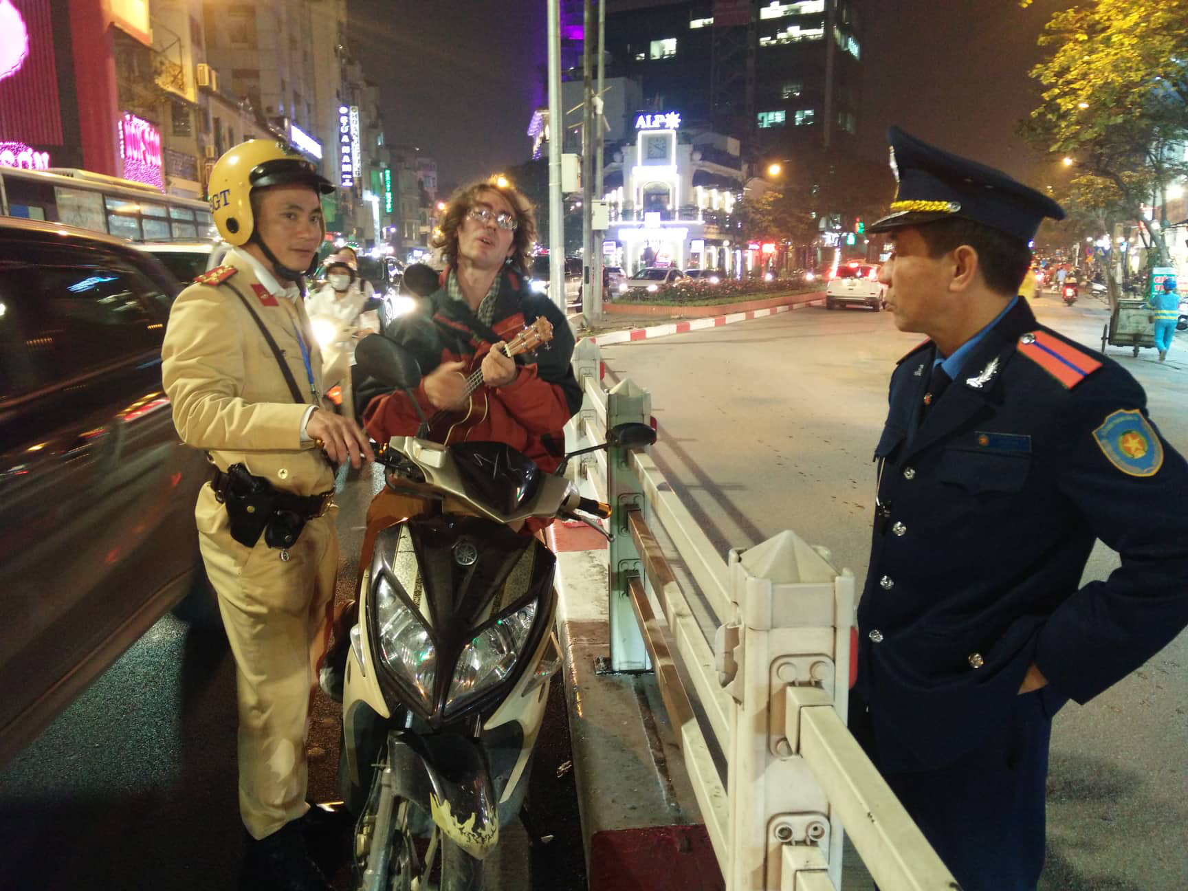 Russian man plays ukulele after pulled over by traffic police in Hanoi