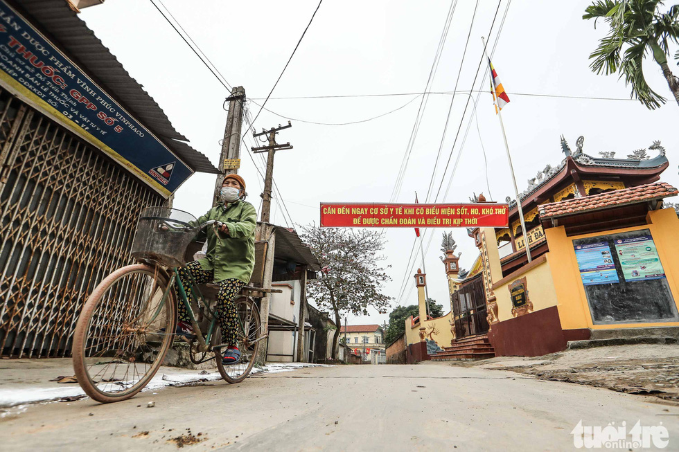 Vietnam seals off commune of 10,600 to control COVID-19