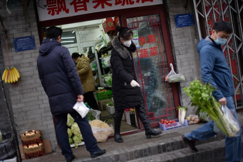 Coronavirus cases in China's Hubei fall for second day, Apple and markets feel impact